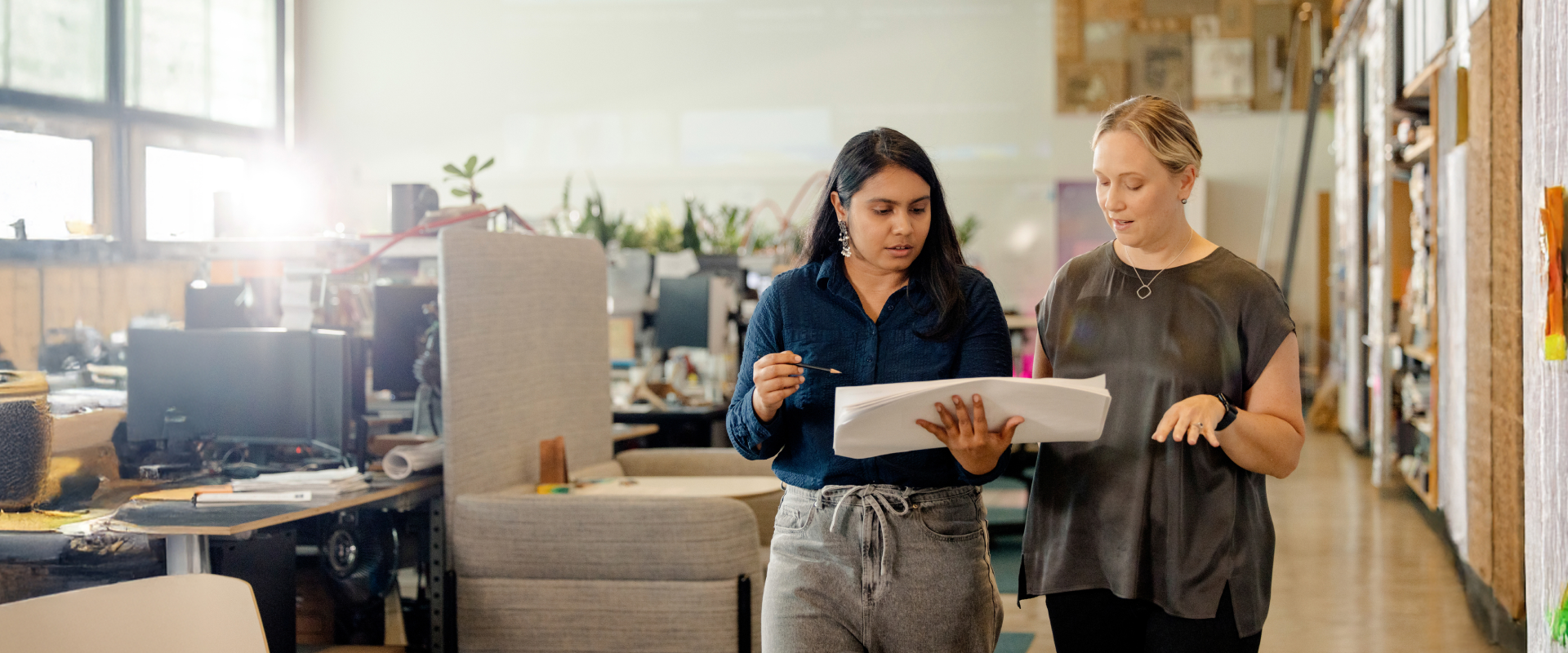 Women working on project management certificate